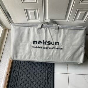Neksun tri-fold design  mattress for easy portability and storage bag.